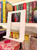 Invisible book stand-